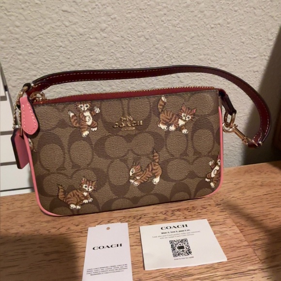 Coach Handbags - Coach Nolita 19 dancing kitten purse